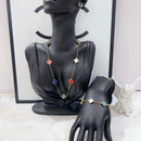 MARHOUHOU friendship necklace gift for her with colorful clover charms on gold chain displayed on black mannequin