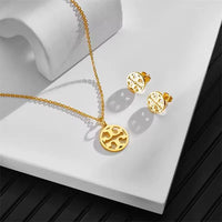 MARHOUHOU gold necklace and earring set with round patterned pendant and matching stud earrings