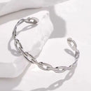 MARHOUHOU silver chain link bangle bracelet with open cuff design on white stone