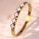 Gold bracelet with white clover charms by MARHOUHOU stylish friendship jewelry gift